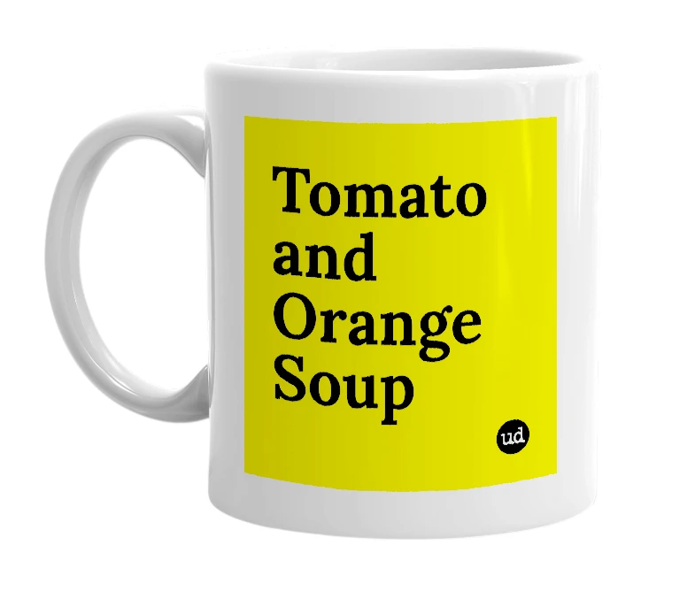White mug with 'Tomato and Orange Soup' in bold black letters