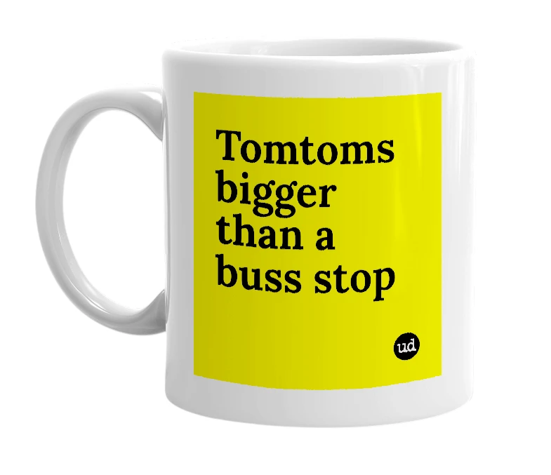 White mug with 'Tomtoms bigger than a buss stop' in bold black letters