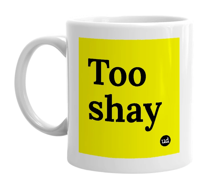 White mug with 'Too shay' in bold black letters