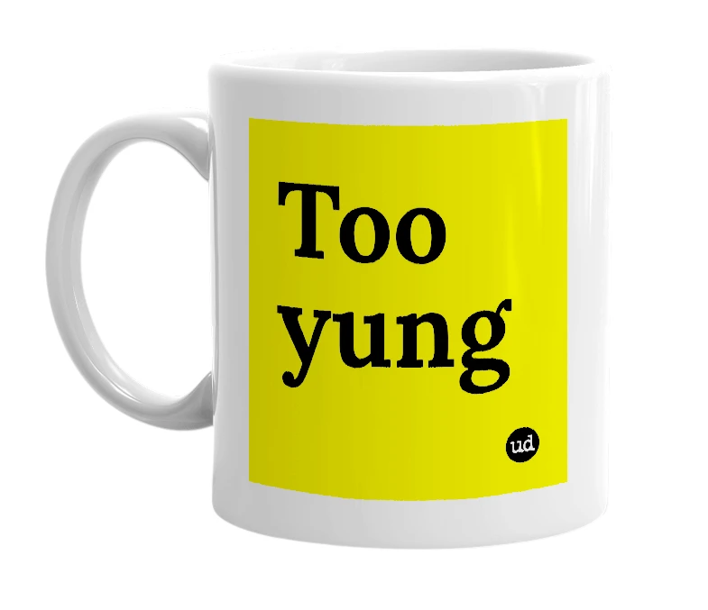 White mug with 'Too yung' in bold black letters