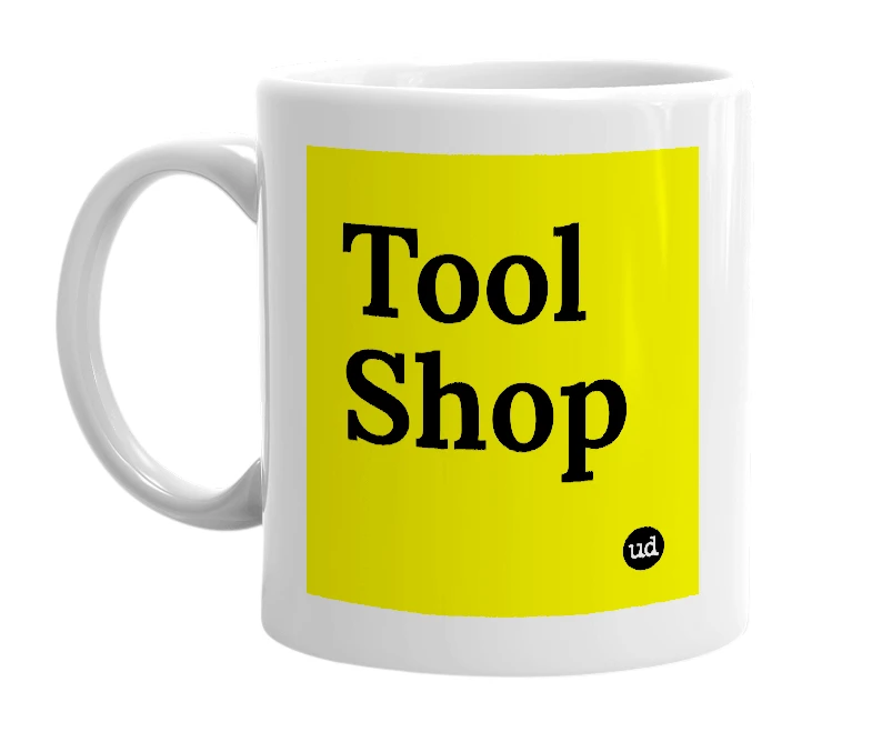 White mug with 'Tool Shop' in bold black letters