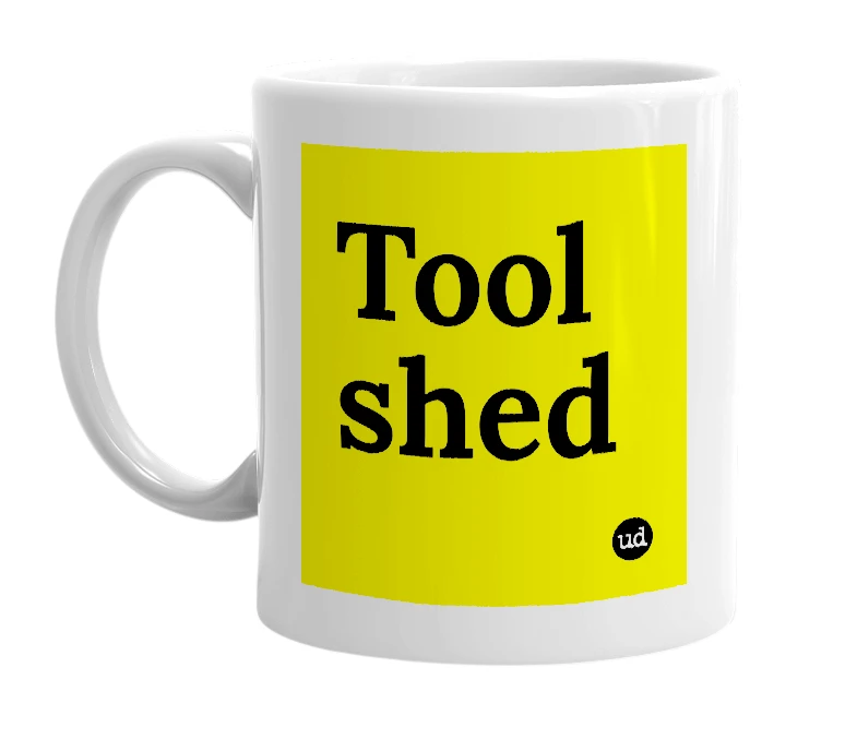 White mug with 'Tool shed' in bold black letters