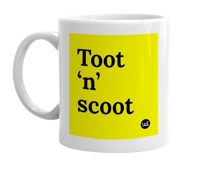 White mug with 'Toot ‘n’ scoot' in bold black letters