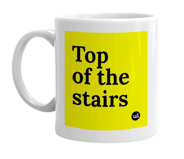 White mug with 'Top of the stairs' in bold black letters