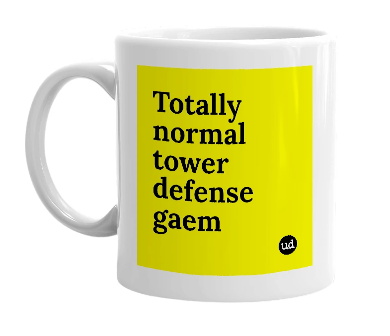 White mug with 'Totally normal tower defense gaem' in bold black letters