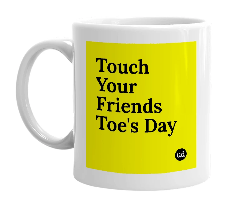 White mug with 'Touch Your Friends Toe's Day' in bold black letters