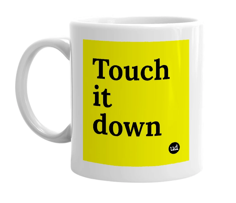 White mug with 'Touch it down' in bold black letters