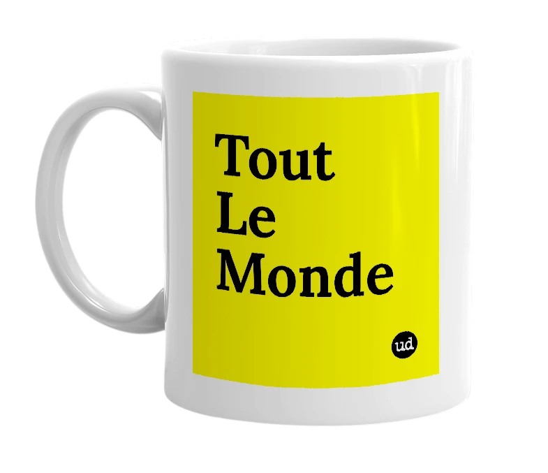 White mug with 'Tout Le Monde' in bold black letters