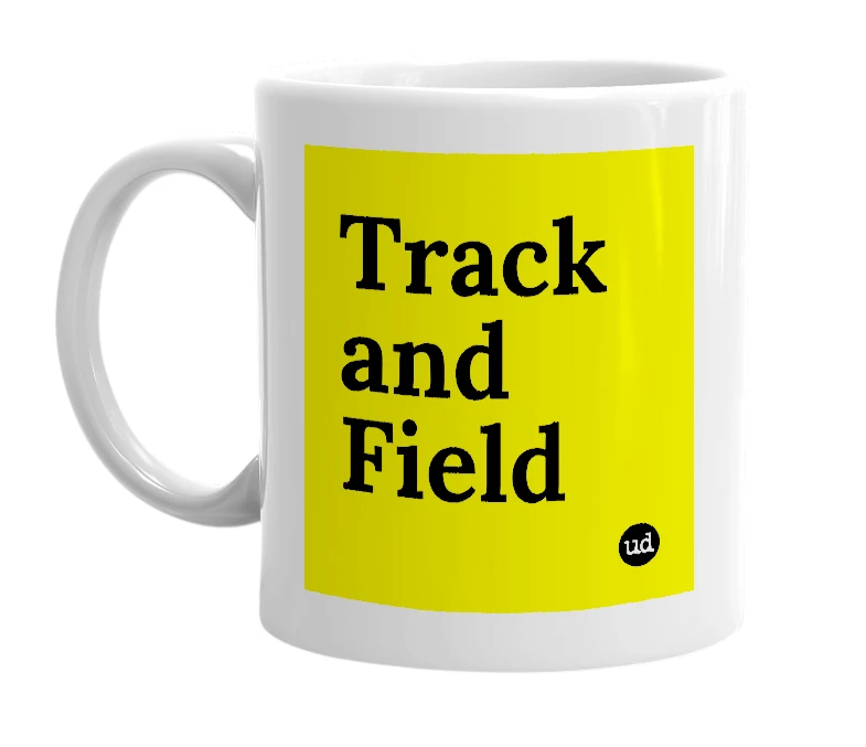 White mug with 'Track and Field' in bold black letters