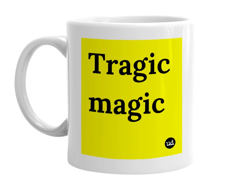 White mug with 'Tragic magic' in bold black letters
