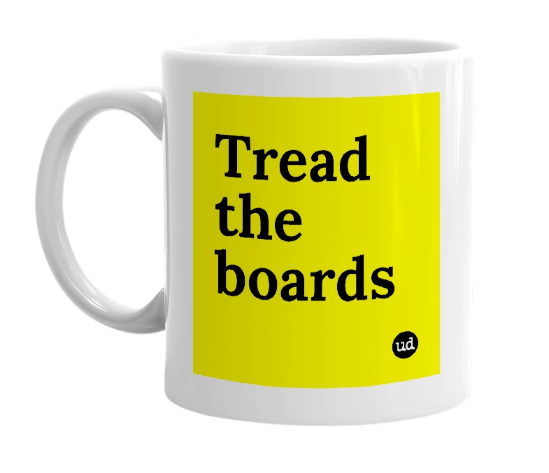 White mug with 'Tread the boards' in bold black letters