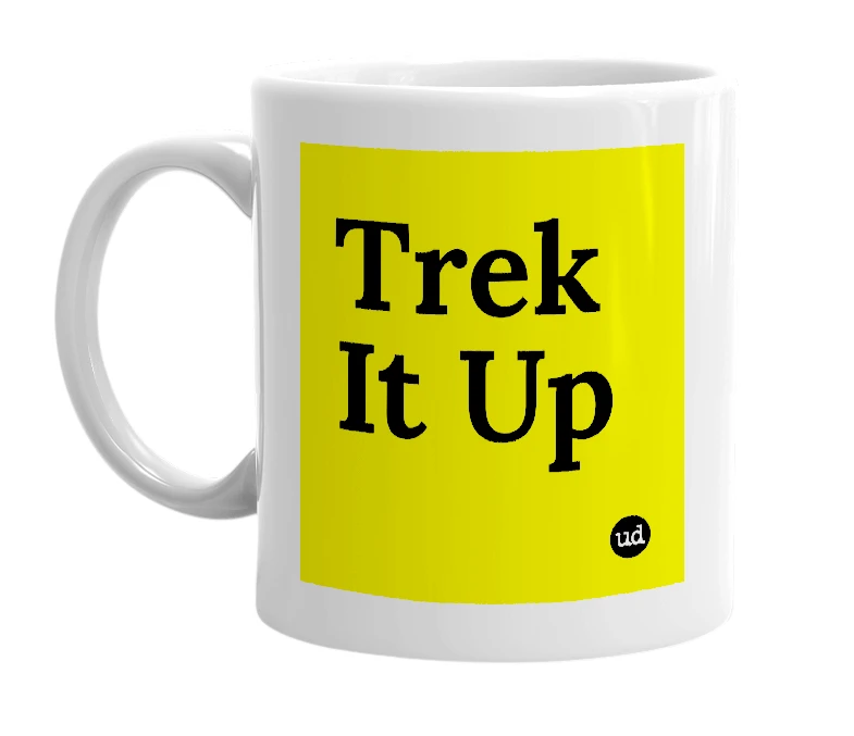 White mug with 'Trek It Up' in bold black letters