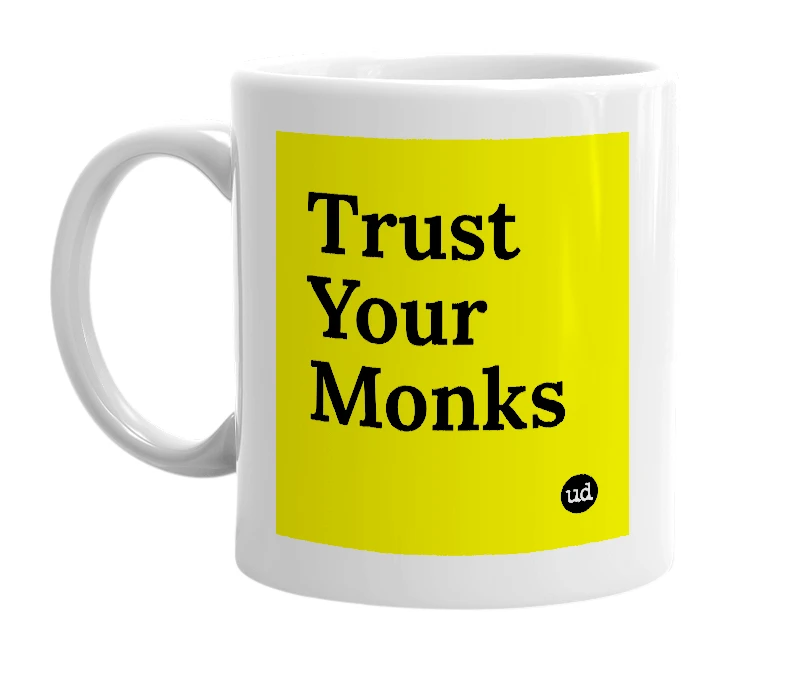 White mug with 'Trust Your Monks' in bold black letters