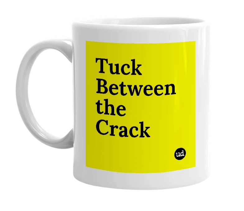 White mug with 'Tuck Between the Crack' in bold black letters