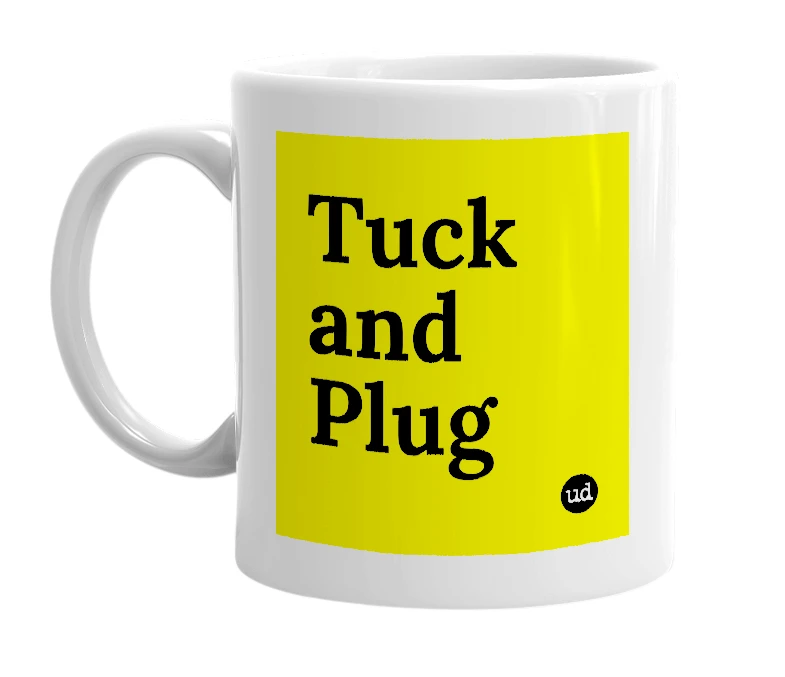 White mug with 'Tuck and Plug' in bold black letters