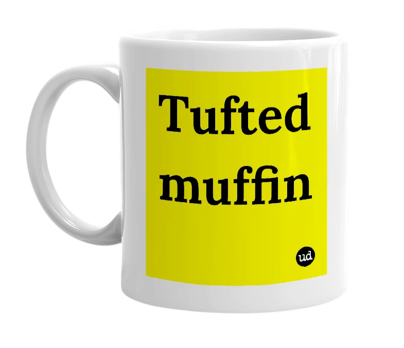 White mug with 'Tufted muffin' in bold black letters