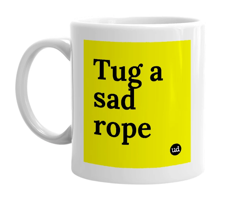 White mug with 'Tug a sad rope' in bold black letters