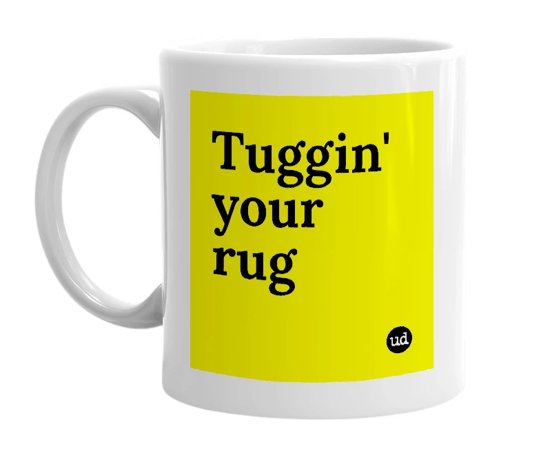 White mug with 'Tuggin' your rug' in bold black letters