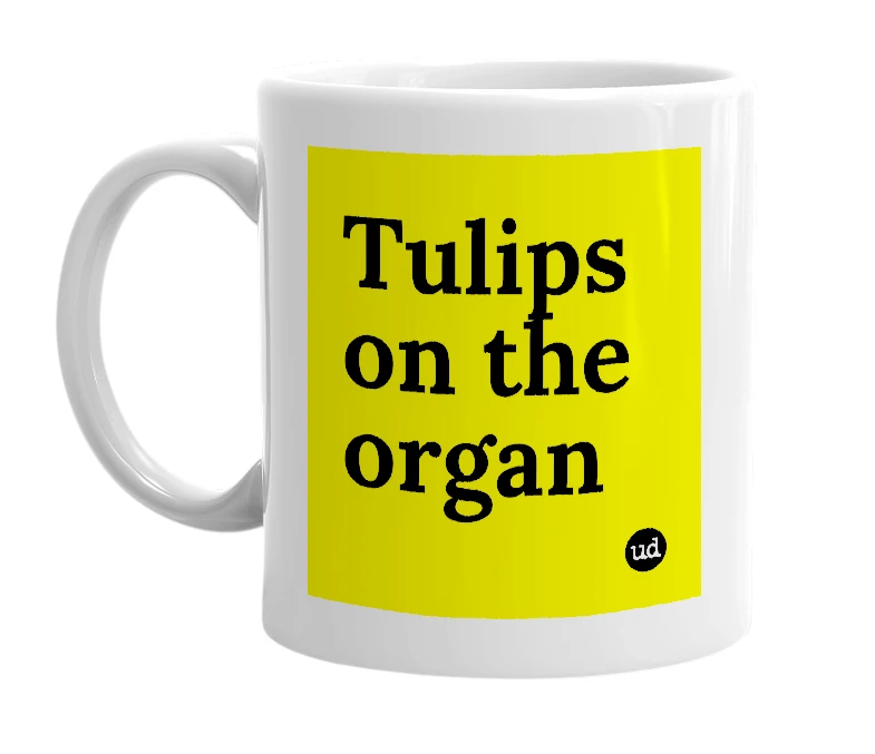 White mug with 'Tulips on the organ' in bold black letters