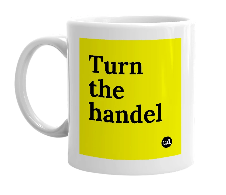 White mug with 'Turn the handel' in bold black letters