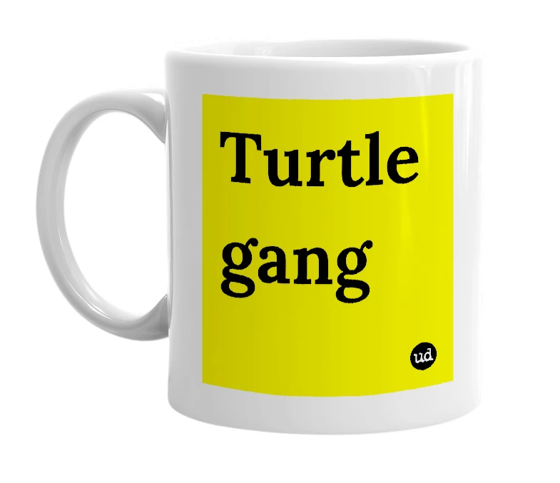 White mug with 'Turtle gang' in bold black letters
