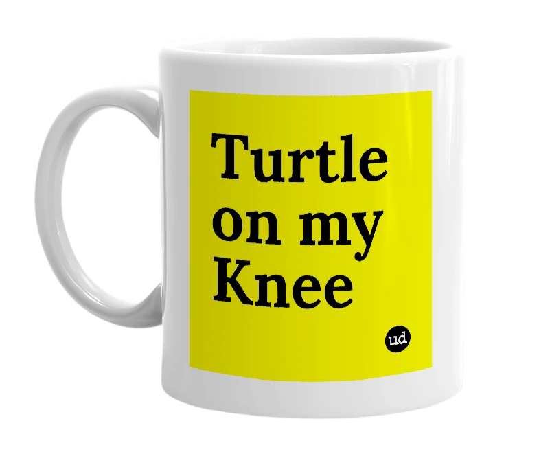 White mug with 'Turtle on my Knee' in bold black letters