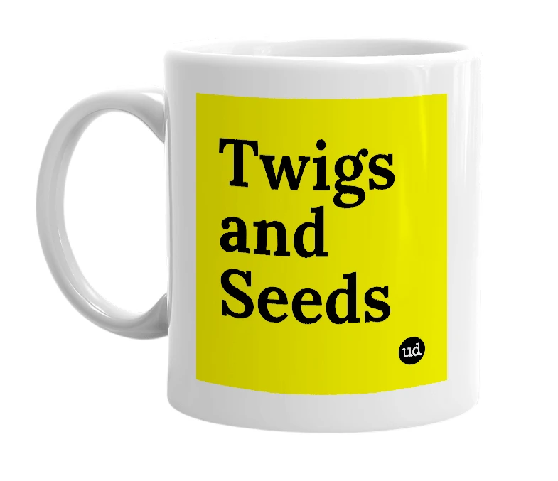 White mug with 'Twigs and Seeds' in bold black letters
