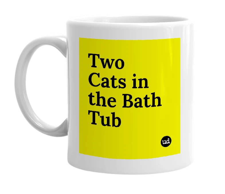 White mug with 'Two Cats in the Bath Tub' in bold black letters