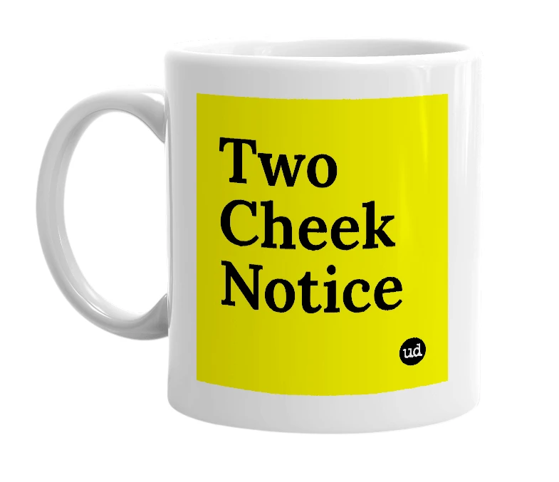 White mug with 'Two Cheek Notice' in bold black letters