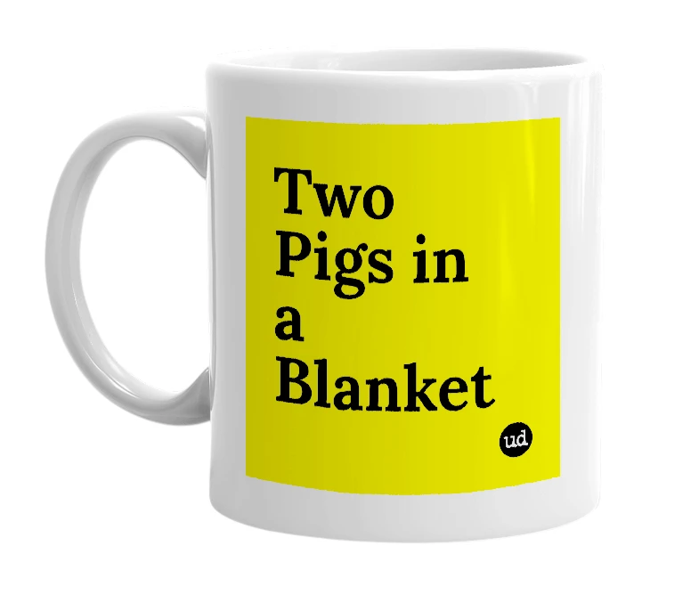 White mug with 'Two Pigs in a Blanket' in bold black letters