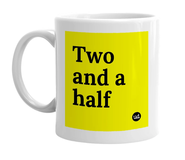 White mug with 'Two and a half' in bold black letters