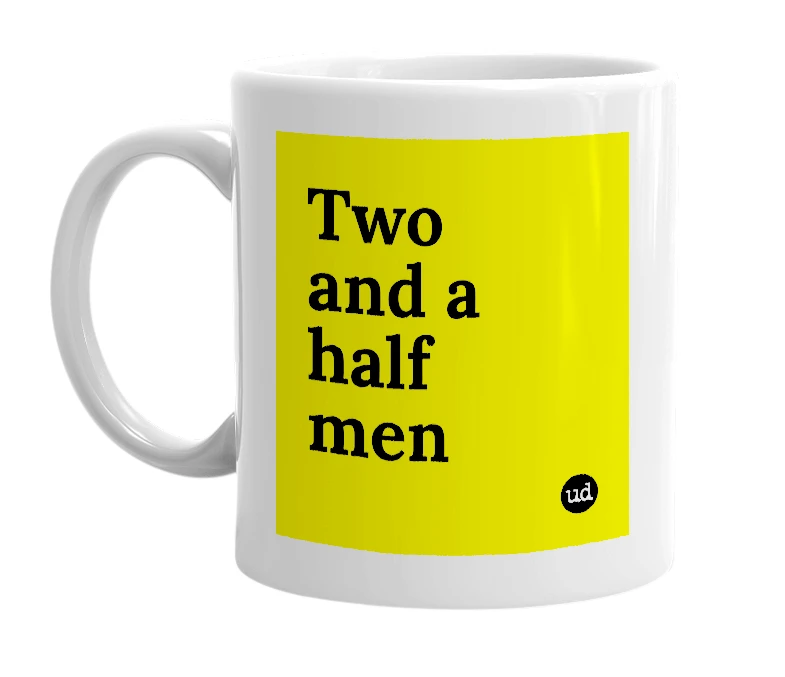 White mug with 'Two and a half men' in bold black letters