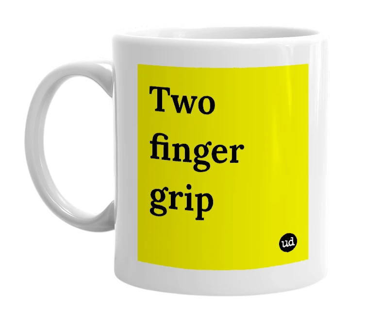 White mug with 'Two finger grip' in bold black letters