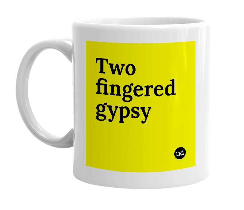 White mug with 'Two fingered gypsy' in bold black letters