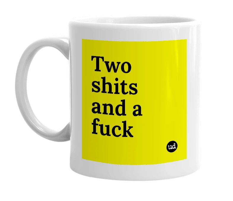 White mug with 'Two shits and a fuck' in bold black letters