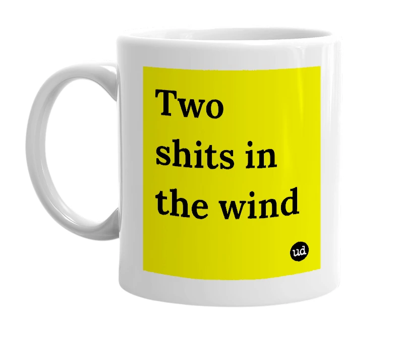White mug with 'Two shits in the wind' in bold black letters