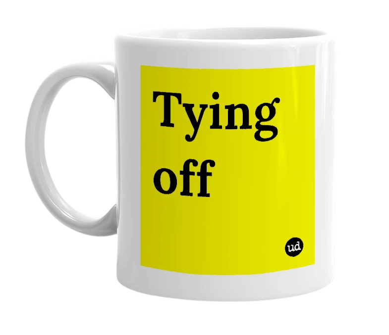 White mug with 'Tying off' in bold black letters