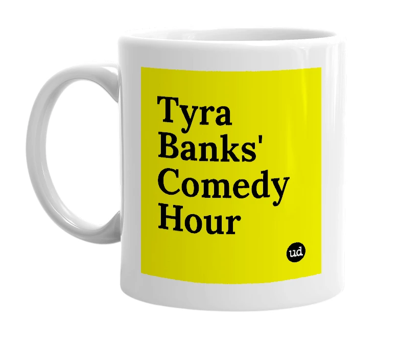 White mug with 'Tyra Banks' Comedy Hour' in bold black letters