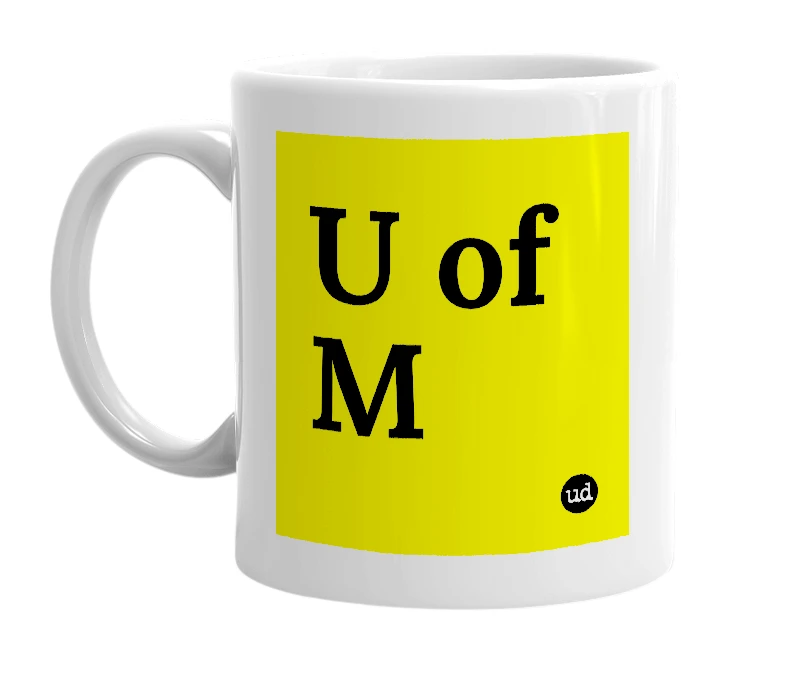 White mug with 'U of M' in bold black letters