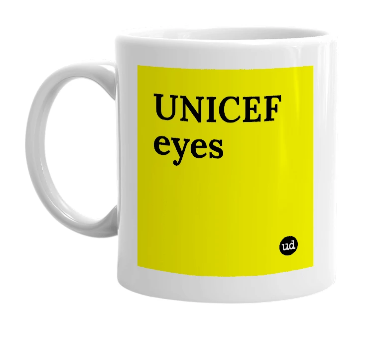 White mug with 'UNICEF eyes' in bold black letters