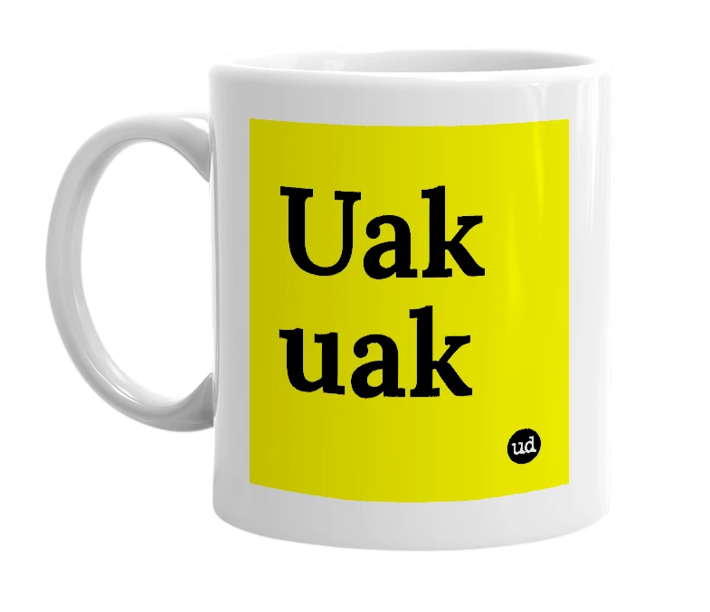 White mug with 'Uak uak' in bold black letters