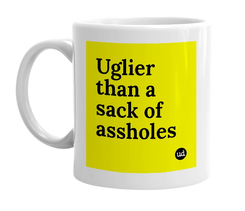 White mug with 'Uglier than a sack of assholes' in bold black letters