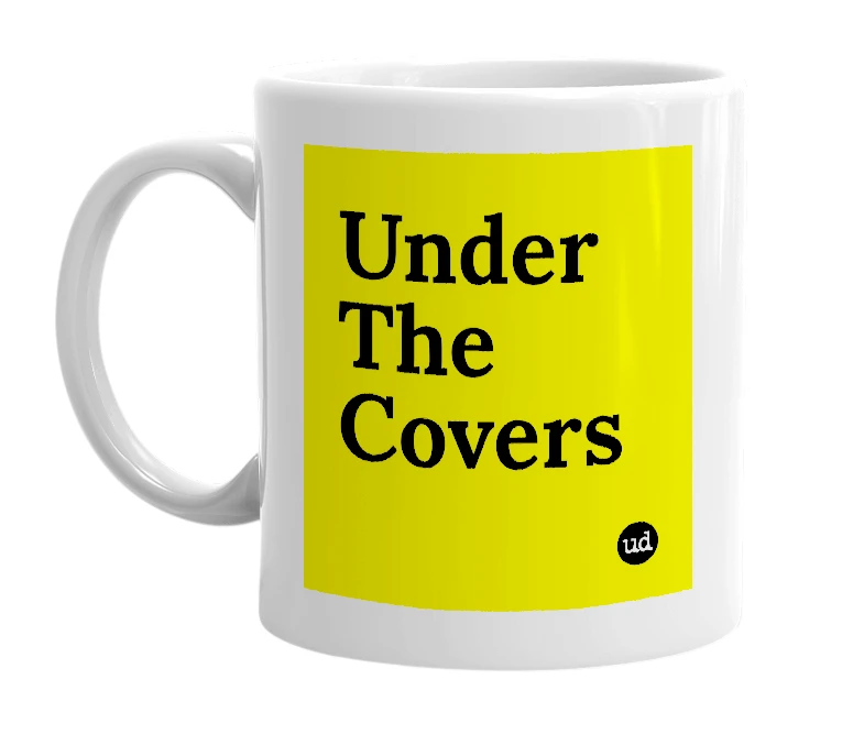 White mug with 'Under The Covers' in bold black letters