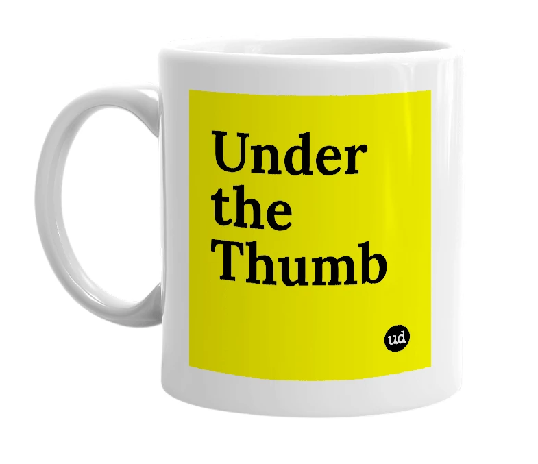 White mug with 'Under the Thumb' in bold black letters