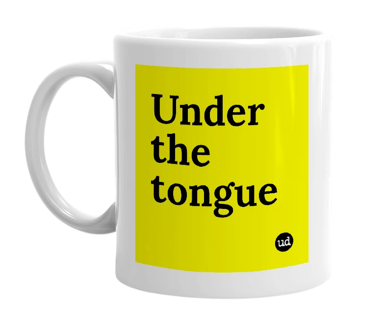 White mug with 'Under the tongue' in bold black letters