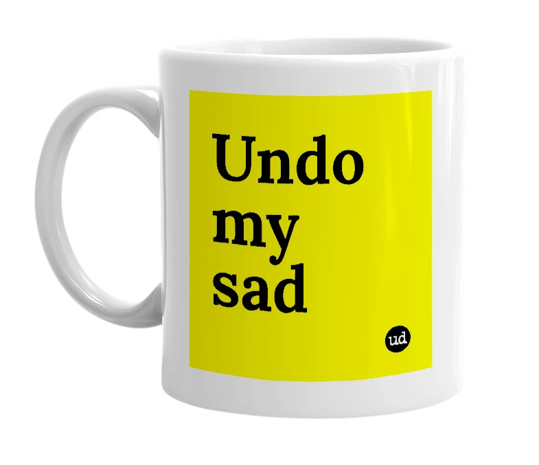 White mug with 'Undo my sad' in bold black letters