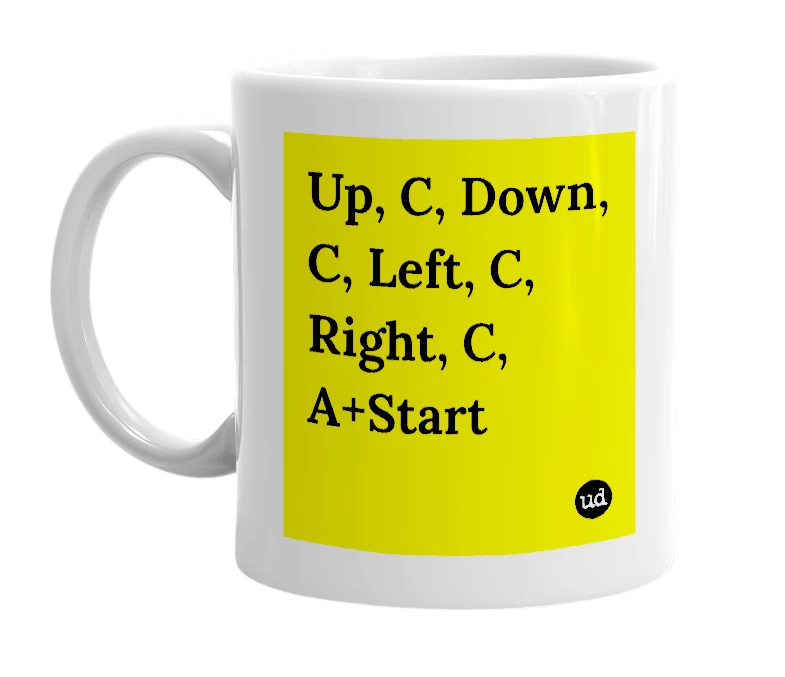 White mug with 'Up, C, Down, C, Left, C, Right, C, A+Start' in bold black letters