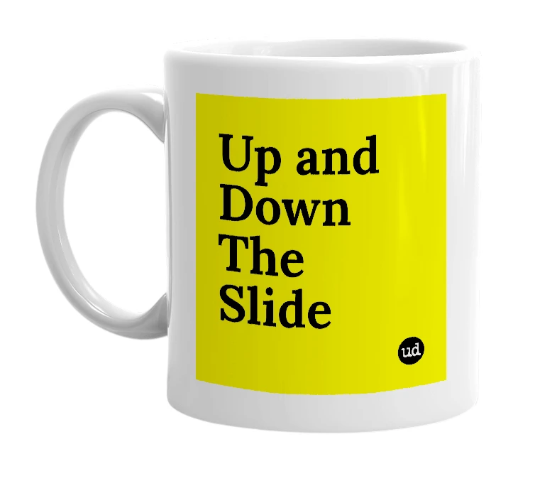 White mug with 'Up and Down The Slide' in bold black letters