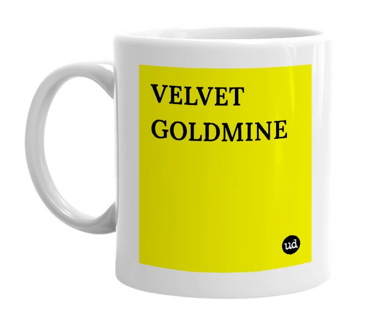 White mug with 'VELVET GOLDMINE' in bold black letters