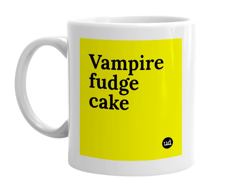 White mug with 'Vampire fudge cake' in bold black letters